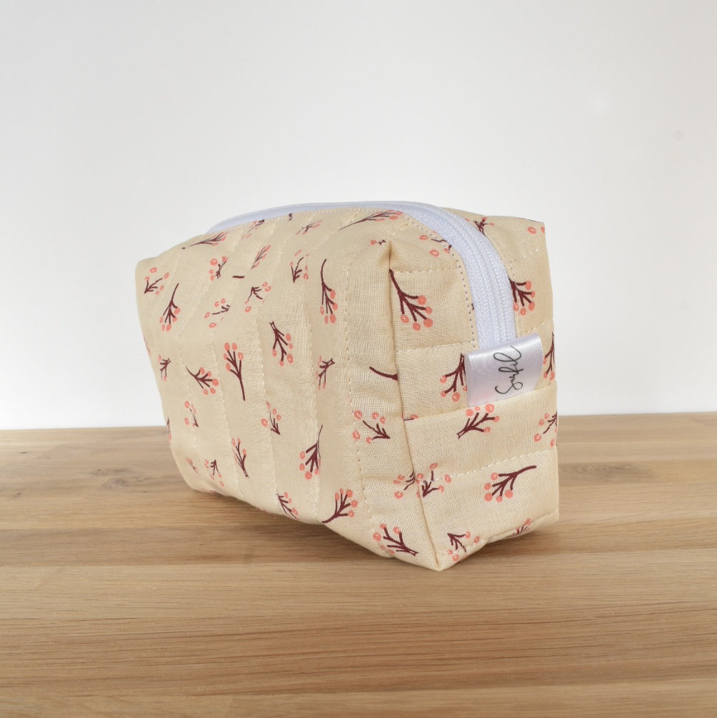 Trousse matelassé.